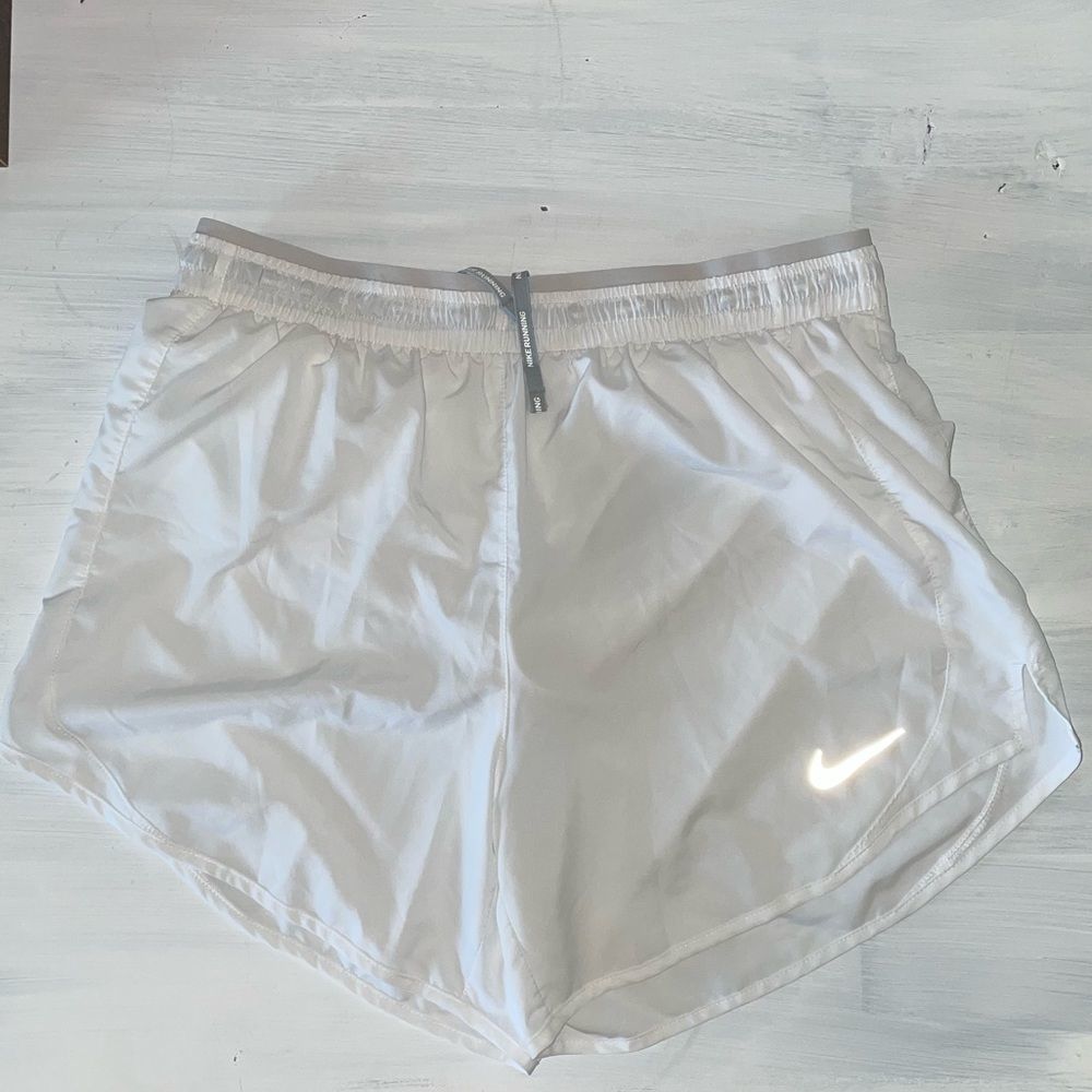Nike Dri Fit white and silver running shorts with drawstring size medium